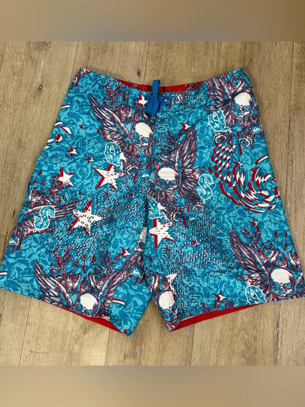 Quiksilver Turquoise & Red Winged Skull Print Swim Trunks